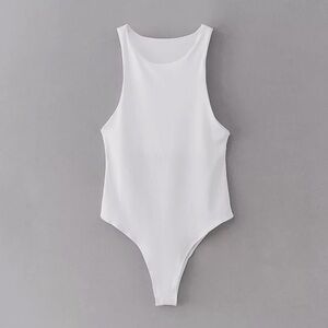 - Bodysuit 
- NWT - Boutique 
- white color
- Available in small, medium, large